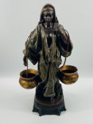 Goldscheider style figure of a lady carrying two pots