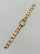 Ladies Rolex wrist watch on 9ct gold strap, in going order,