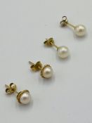 Two pairs of gold and pearl stud earrings