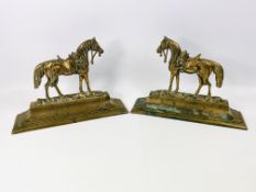 Pair of cast brass decorative mantel ornaments