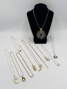 Eleven silver necklaces
