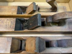 A quantity of early 20th century wooden jack and moulding planes
