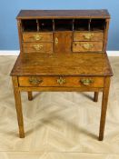 Early 19th century oak writing table