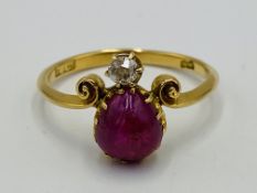 18ct gold ring set with a ruby and diamond
