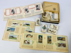 A collection of early 20th century cigarette cards