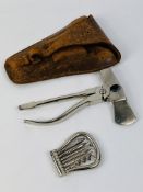 An early 20th century leather cased multi tool by A.Barrett & Sons, 64 Piccadilly London