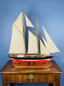Two mast wooden pond yacht in full sail