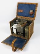 A travel tea making set in wicker case