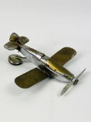 A vintage chrome plated car mascot in the form of a Spitfire