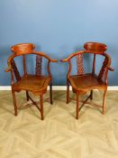 A pair of Chinese hardwood corner chairs