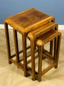 A Chinese nest of three hardwood tables