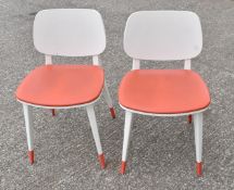 4 x Contemporary Restaurant Dining Chairs Featuring a White Finish and Orange Seat Pads -