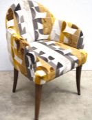 1 x Lounge Chair Featuring Midcentury-Inspired Geometric Upholstery and Curved Back Rest