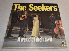 1 x THE SEEKERS 12 Inch Vinyl LP Record - A WORLD OF THEIR OWN - Five Record Box Set 1965