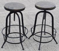 Pair of Rustic Iron Adjustable Bar Stools With Curved Legs and Wooden Seats