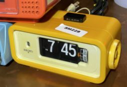 1 x Vintage Japanese Seiko DP666T Digital Flip Alarm Clock With a Yellow Body