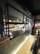 1 x Restaurant Passthrough Kitchen Counter Featuring a Large Black Corian Worksurface