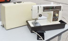 1 x Toyota Super Stretch Stick Sewing Machine - Model 888 - Includes Case and Foot Pedal