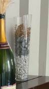 1 x Glass Vase with Stones and an Artificial Plant