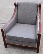 Pair of Stylish Upholstered Lounge Armchairs with Sweeping Curved Design and Studded Detail -