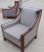 Pair of Stylish Upholstered Lounge Armchairs with Sweeping Curved Design and Studded Detail -