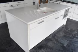 1 x SieMatic Fitted Kitchen Island Featuring a High Gloss Finish, Corian Worktop with Integrated Sin