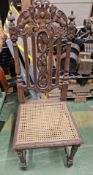 Set of 4 x Baronial Style Carved Oak Dining Chairs with Rattan Seat Panels