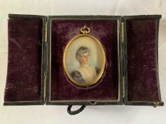 Oval portrait miniature, circa early 20th century, hand painted on bone, initialed 'E.M.S.', loosely