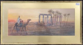 Giovanni Barbaro (Italian,1964-1915), Middle Eastern scene with a figure riding a camel and ruins