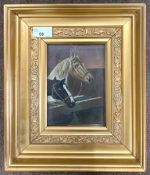 British School, late 19th/ early 20th century, Study of two horses heads in a stable, initialed WFC,