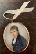 19th century, Regency Gentleman in a navy morning coat, oil miniature in oval, 5x6cm, framed and