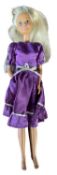 Sindy in purple dress with silver belt and hem detail (c1980s)