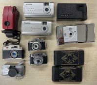 A mixed lot of various vintage and modern miniature cameras