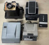 Five vintage Polaroid cameras plus a modern mini photo printer.