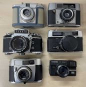 Six vintage cameras, to include: Bilora Bella 66; Exakta Varex IIb; Baldessa Balda; Hanimex VF