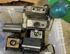 Five various polaroid cameras