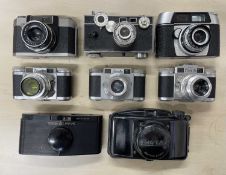 Eight vintage cameras to include: Braun Super Paxette; Braun Paxette (x2); Welmy; Purma Special;