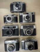 Seven vintage cameras to include: Agfa; Braun Super Paxette; Regular Sporting BC; Taron Vic; Coloxa;