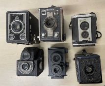 Six vintage box cameras to include: Kodak Brownie; Gorz Frontar; Gevabox; Agfa Synchro Box; Ensign