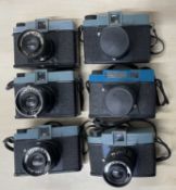 Six vintage plastic cameras