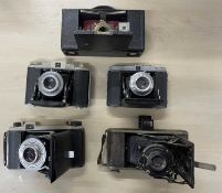 Five vintage cameras, to include: Kodak No. 2 Folding Pocket Brownie; Dacoma; Kodak 66, model II;