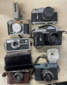 Six vintage cameras to include: Zorki-4; Howay Anny; Zenit-E Moshiva; Kodak Instamatic 500; Diana-F;