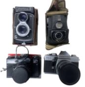 Four vintage cameras, to include: Yashica B; Ensign Ful Vue; Zenit EM; Praktica MTL3