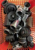 One basket of assorted camera lenses, lens caps etc