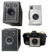 Four vintage cameras, to include a Kodak Six-20 Brownie D; Kodak Six-20 Super Model Brownie