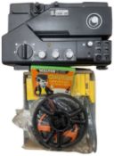 A vintage Sankyo Sound-SCD with manual and various cinereels to include Charlie Chaplin