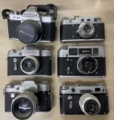 Six vintage cameras to include: Zopkuu C; Zorki 6; FED 4; Zenit 3M (x2); Asahi Pentax
