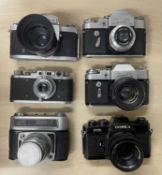Six vintage cameras to include: Miranda, Zenit 3 (x2); FED 10; Yashica and one other Soviet model (