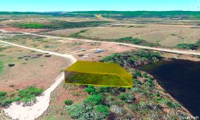 Cheboygan County, Michigan: Buildable Lot Between a Lake & a Golf Course!