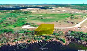 Cheboygan County, Michigan: Buildable Lot Between a Lake & a Golf Course!